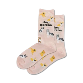 pink crew socks with pattern of dogs wearing outfits. dog person words on socks.  