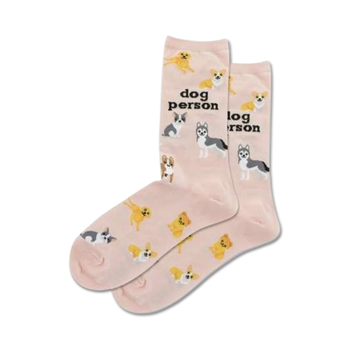 pink crew socks with pattern of dogs wearing outfits. dog person words on socks.  