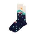 Pair of navy crew socks with a cream-colored band showing a red camper van, teal trees, and mountains. 