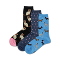 Three pairs of crew socks. One pair is black with Siamese cats, one is navy with pink polka dots, and one is light blue with dachshunds and dalmatians.