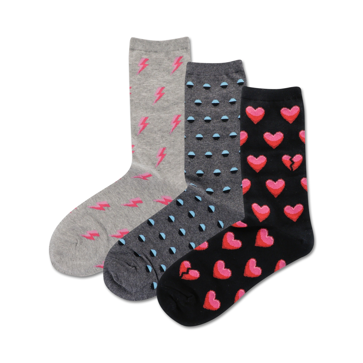 Three pairs of crew socks: gray with pink lightning bolts, gray with teal polka dots, and black with pink whole and broken hearts.