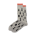 Pair of gray crew socks with a pattern of black chess pieces.  Features orange trim at the top.