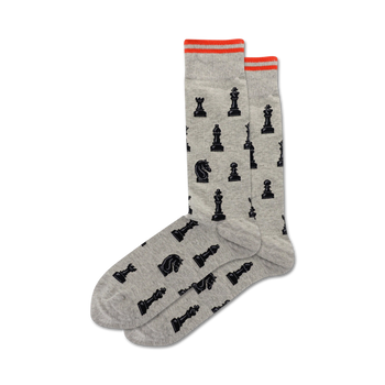 gray crew socks feature repeating pattern of black chess pieces: king, queen, bishop, knight, and rook.  