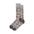 A pair of grey crew socks with a repeating pattern of yellow and red bicycles. 