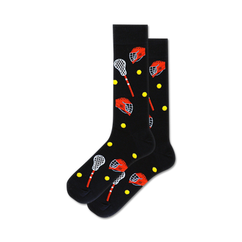 Pair of black crew socks with red lacrosse helmets and sticks, and yellow dots. 
