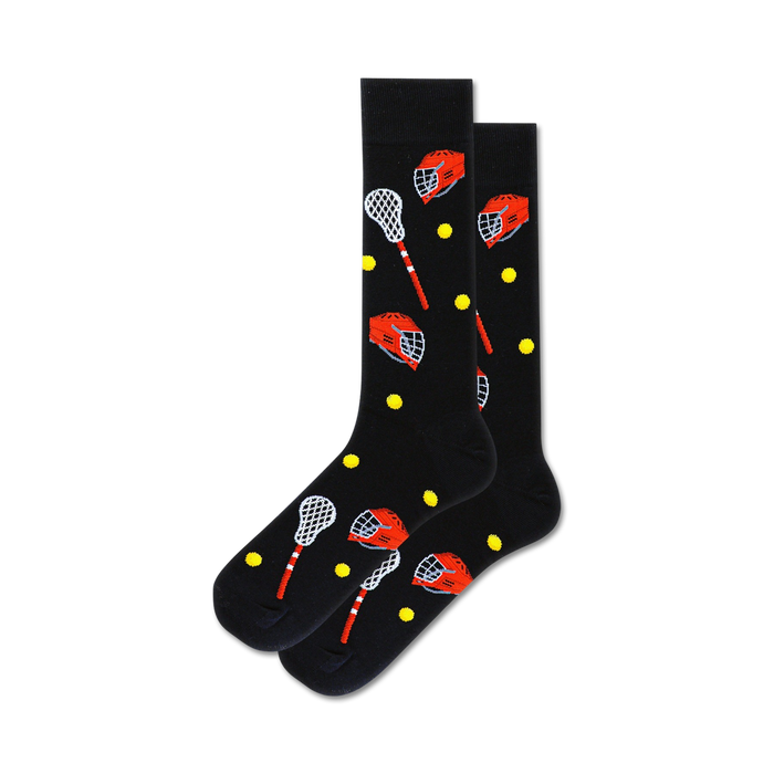 lacrosse-themed crew socks in black with red helmets and yellow balls   }}