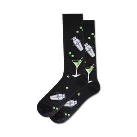 black crew socks feature a pattern of martini glasses and cocktail shakers with green olives, perfect for any martini lover.  