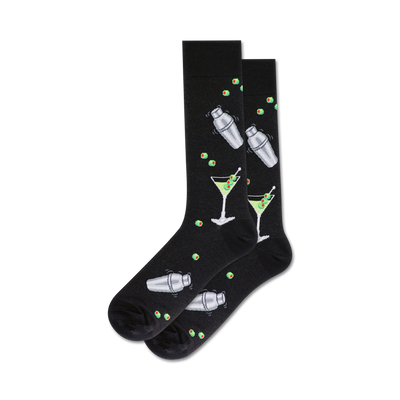 black crew socks feature a pattern of martini glasses and cocktail shakers with green olives, perfect for any martini lover.  