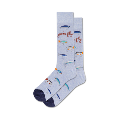 Pair of blue crew socks with a pattern of fishing lures and the phrase 'You're Fly'.
