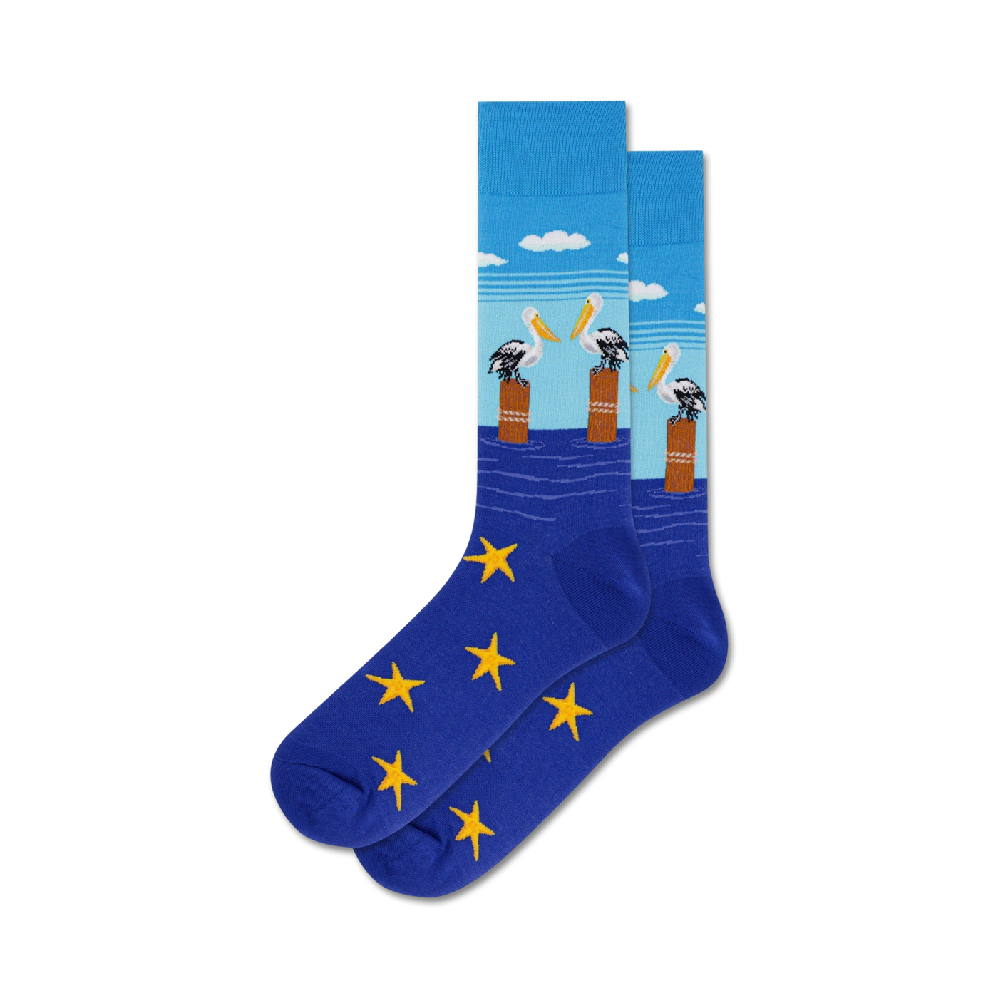 Pair of crew socks in blue with yellow stars. The top features a design of three pelicans on posts in the water under a light blue sky.