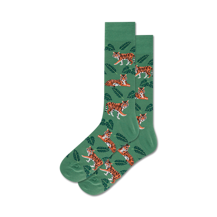 green crew socks with orange tigers lounging among green leaves, made for men.   