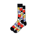 Pair of crew socks in red, yellow, black, and blue, featuring a Mondrian-inspired geometric design.