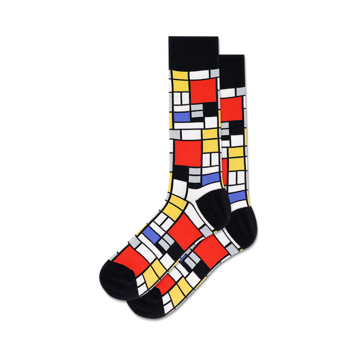 geometric mondrian-inspired red, blue, yellow, and black blocks on white background. crew socks for men.   }}