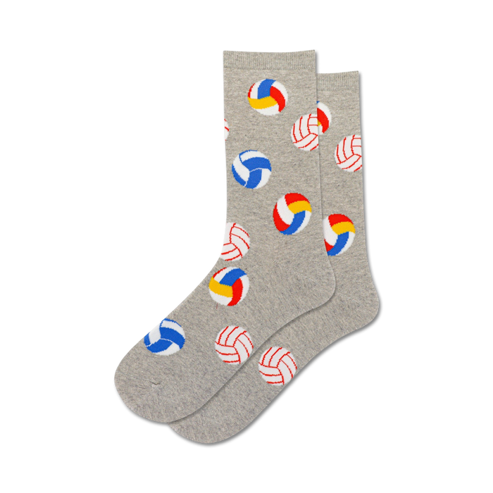 gray volleyball crew socks adorn a pattern of multicolored volleyballs, perfect for ladies who love spiking balls in style.    }}
