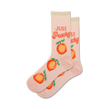 Pair of pink crew socks with peaches and 'Just Peachy' text.  Features orange peaches and retro-style lettering on a light pink background.