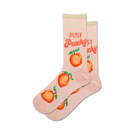 crew length pink just peachy socks feature a cheerful pattern of peaches with green leaves.  