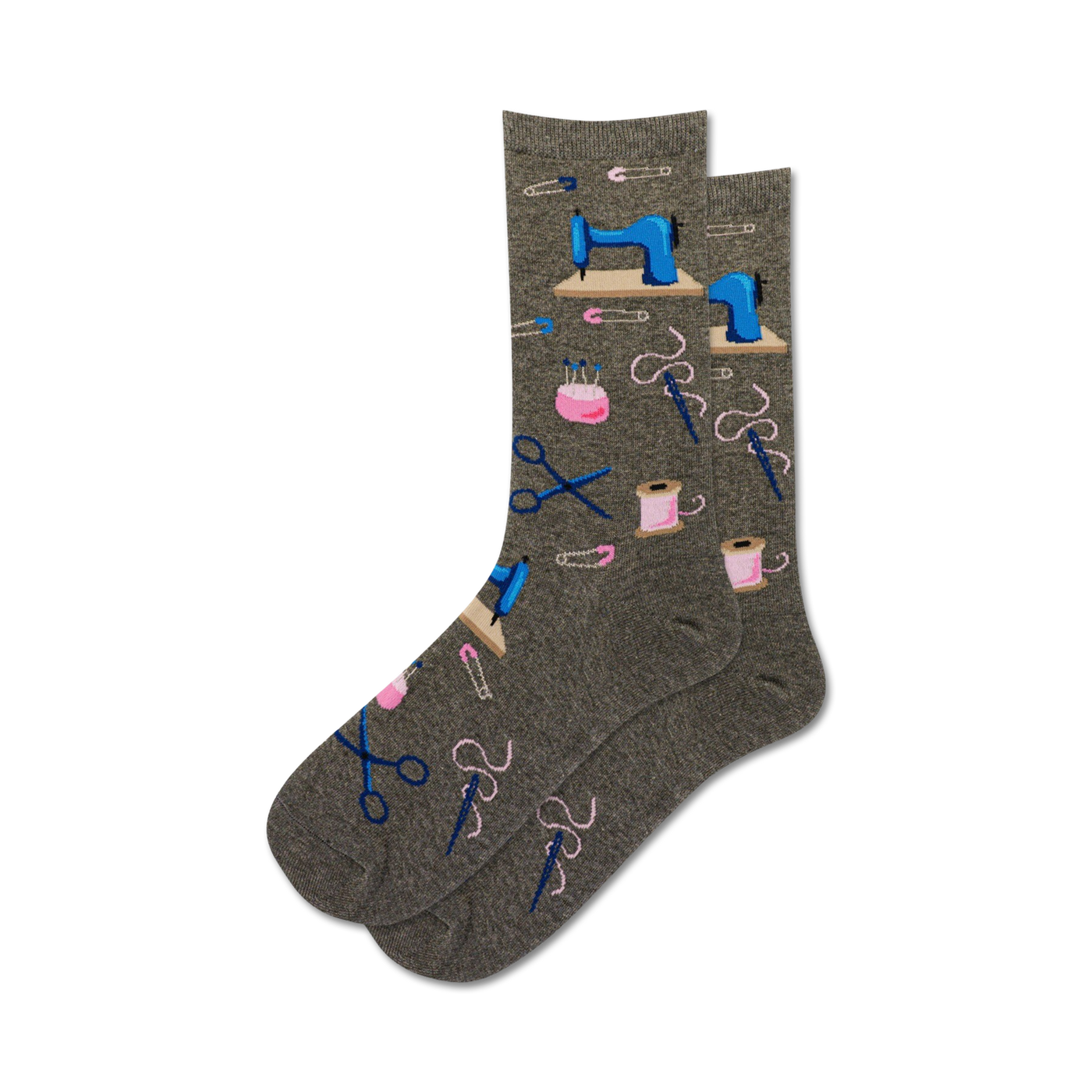 Pair of grey crew socks with a fun pattern of sewing supplies: sewing machines, scissors, pins, and thread spools in pink and blue.