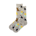 Pair of crew socks in grey and pink; featuring a repeating pattern of cute black and orange cats drinking tea, scratching and playing in a bowl.