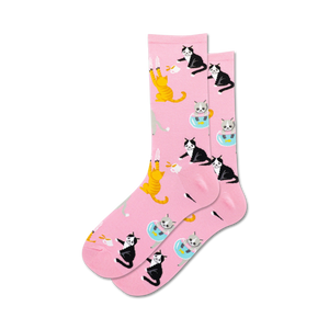 pink crew socks featuring a pattern of cartoon cats in various poses, with fish; for women.   