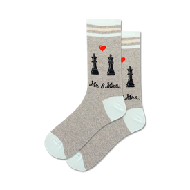 here is a matter of fact alt text description of the product:  "gray crew socks with a black king and queen chess piece pattern, red hearts above each piece, and the words "mr. & mrs." for women."   