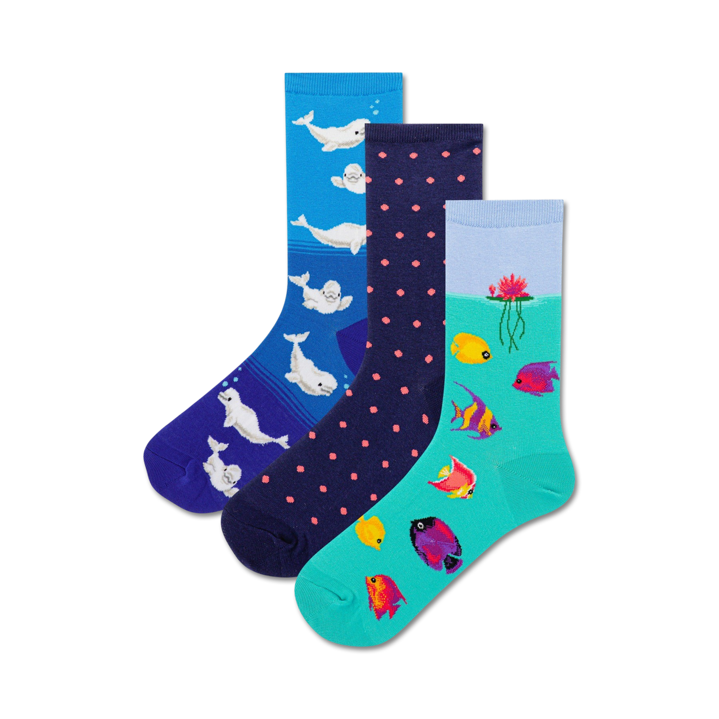 Three crew socks: one blue with beluga whales, one navy with pink polka dots, one teal with colorful fish and a water lily.