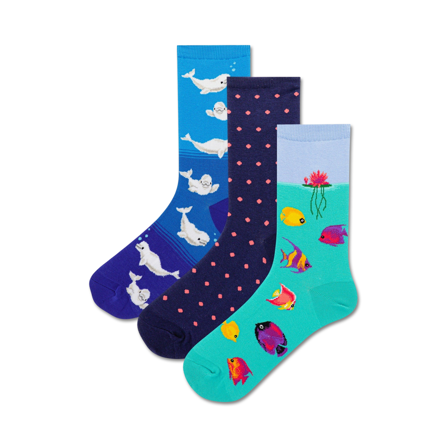 Three crew socks: one blue with beluga whales, one navy with pink polka dots, one teal with colorful fish and a water lily.
