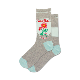 gray socks with light blue toe, heel, and cuff. pink rose design with green leaves and a red center. floral theme. ribbed texture. crew length.  