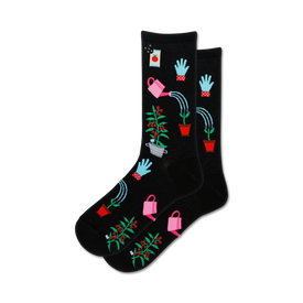 black crew socks for women feature a pattern of gardening tools and plants, perfect for any green thumb.   