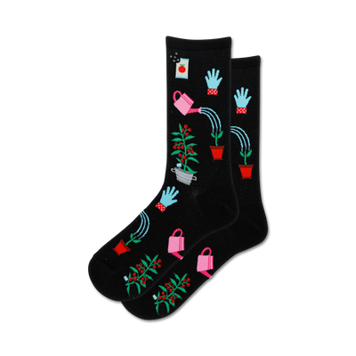 black crew socks for women feature a pattern of gardening tools and plants, perfect for any green thumb.   