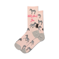 Pair of blush pink crew socks with black and white zebras and the text 'Wild About You'.