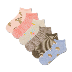  pink rabbits and brown hedgehogs frolic among flowers on these whimsically patterned womens ankle socks.  