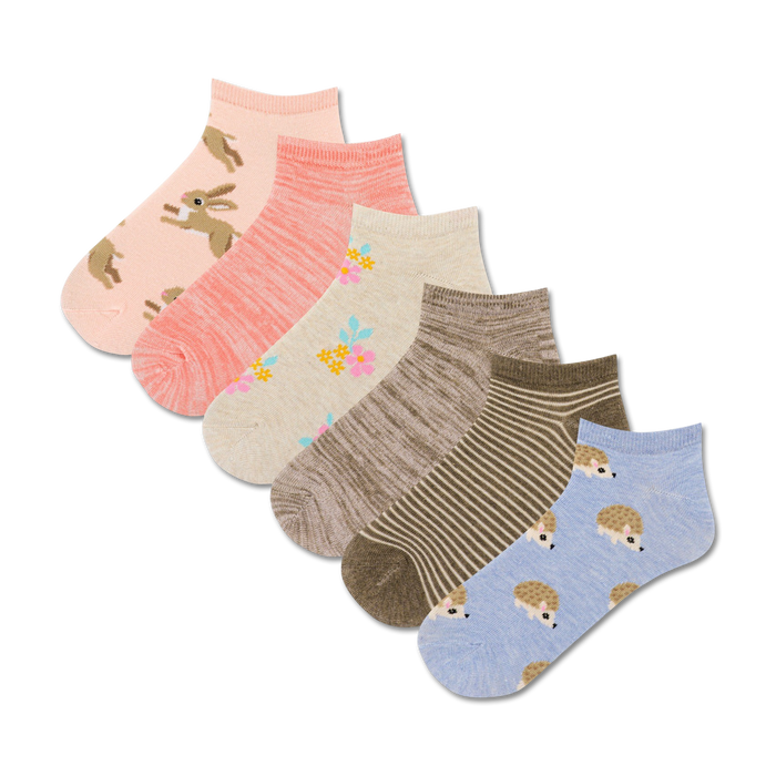  pink rabbits and brown hedgehogs frolic among flowers on these whimsically patterned womens ankle socks.   }}