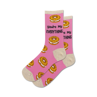 pink crew socks for women with pattern of bagels and cream cheese.   