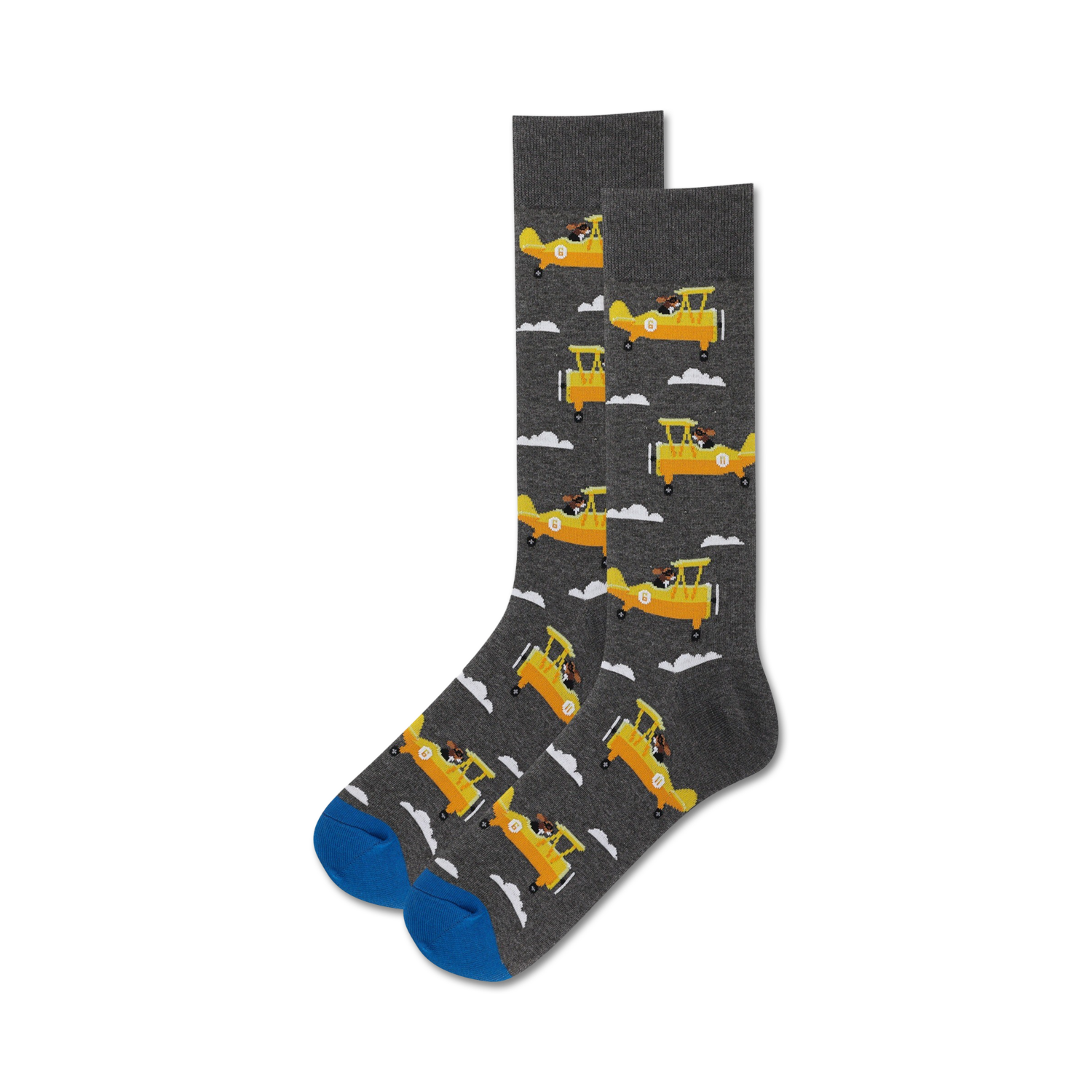 Close-up of a pair of gray crew socks with yellow airplanes and dogs; blue sole.