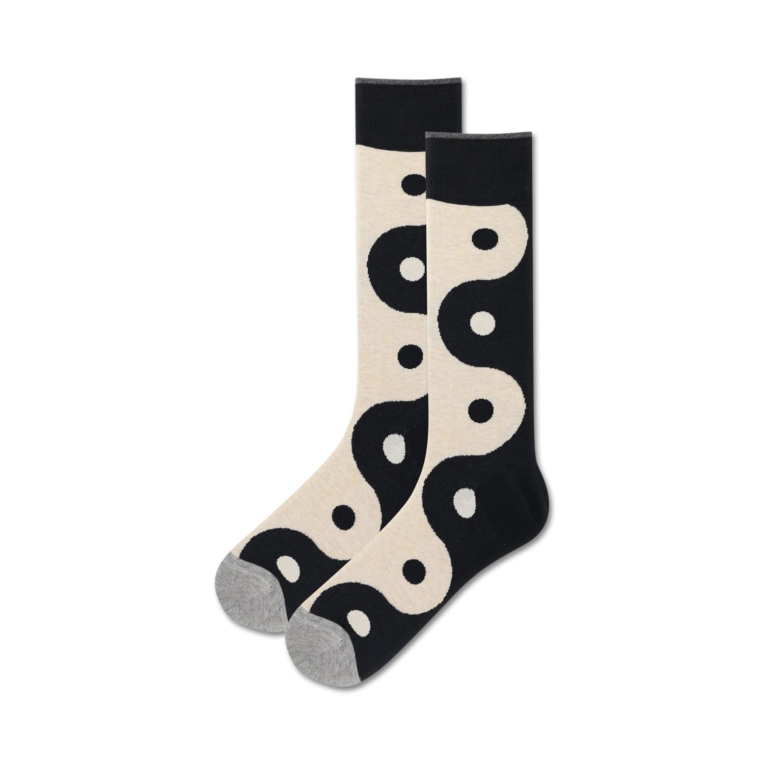 Pair of cream and black crew socks featuring a repeating yin yang pattern.  A stylish and comfortable choice for everyday wear.