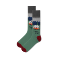 Pair of crew socks in green, grey, and burgundy.  The socks feature a vintage camper illustration, mountains, and the text 'I sleep around'.