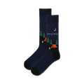 Pair of navy blue crew socks with a whimsical camping scene at night, including orange tent, green trees, and a crescent moon.