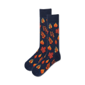 Pair of navy blue crew socks adorned with an autumnal design of orange and red leaves.