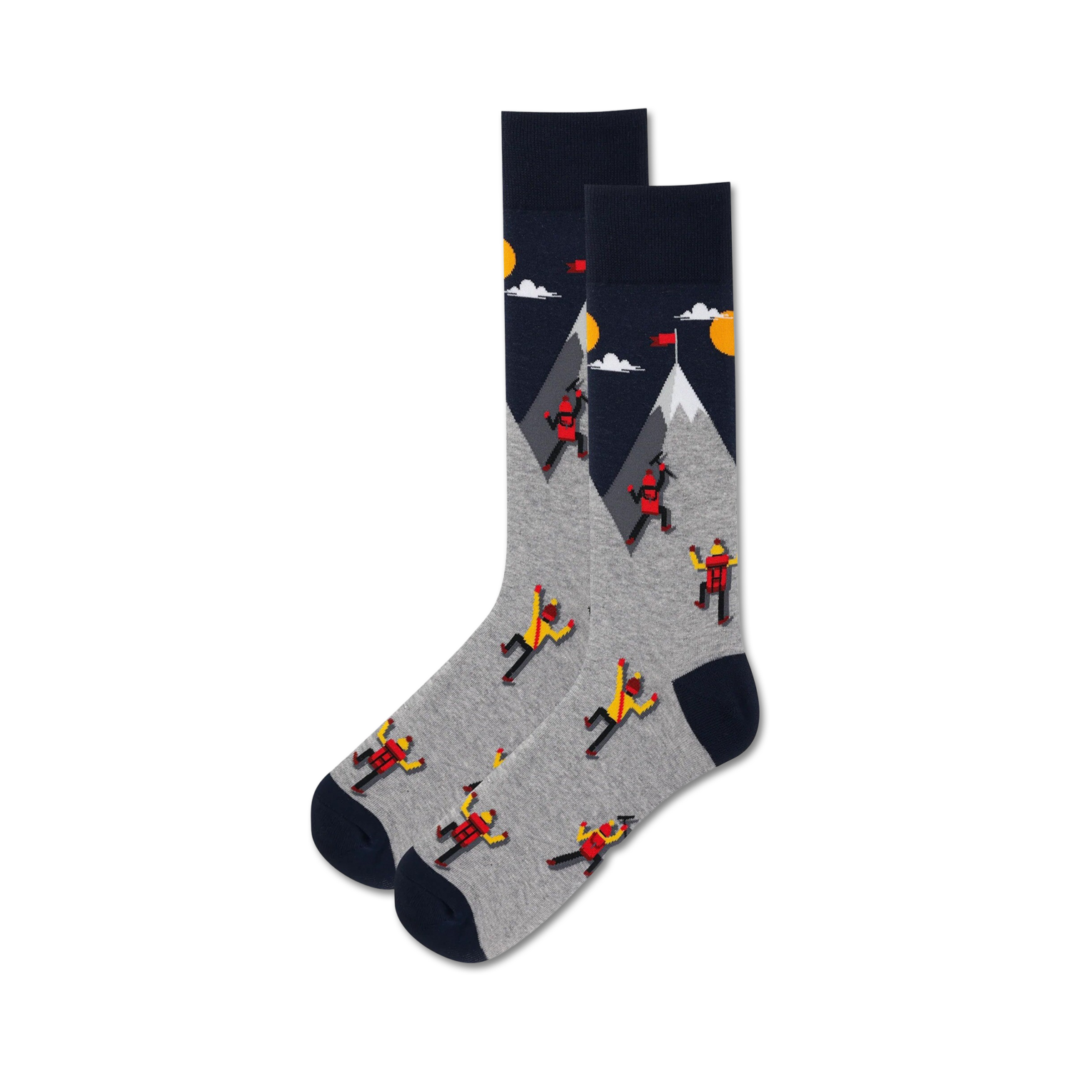 Pair of grey and navy crew socks. Design features cartoon climbers ascending a mountain with a yellow sun and clouds.