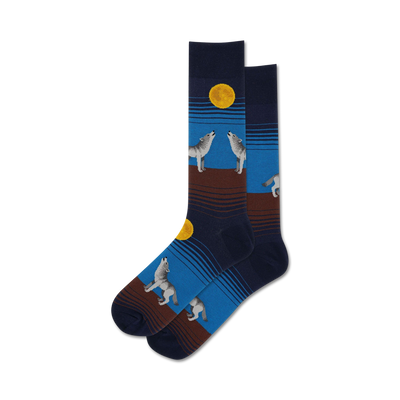   mens crew socks feature howling gray and white wolves under yellow moon on a dark blue background with blue and brown stripes.  