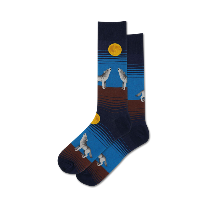   mens crew socks feature howling gray and white wolves under yellow moon on a dark blue background with blue and brown stripes.   }}