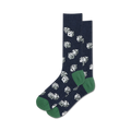 Pair of navy crew socks with a white dice pattern and green cuffs. 