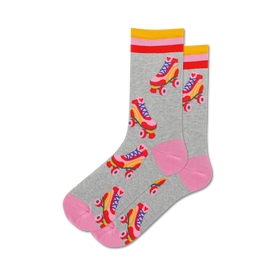 gray crew socks with pink and blue roller skates. pink top with two yellow and one red stripe. pink bottom.  