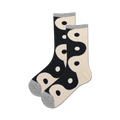 Pair of crew socks in black and cream, featuring a repeating yin yang symbol design. 