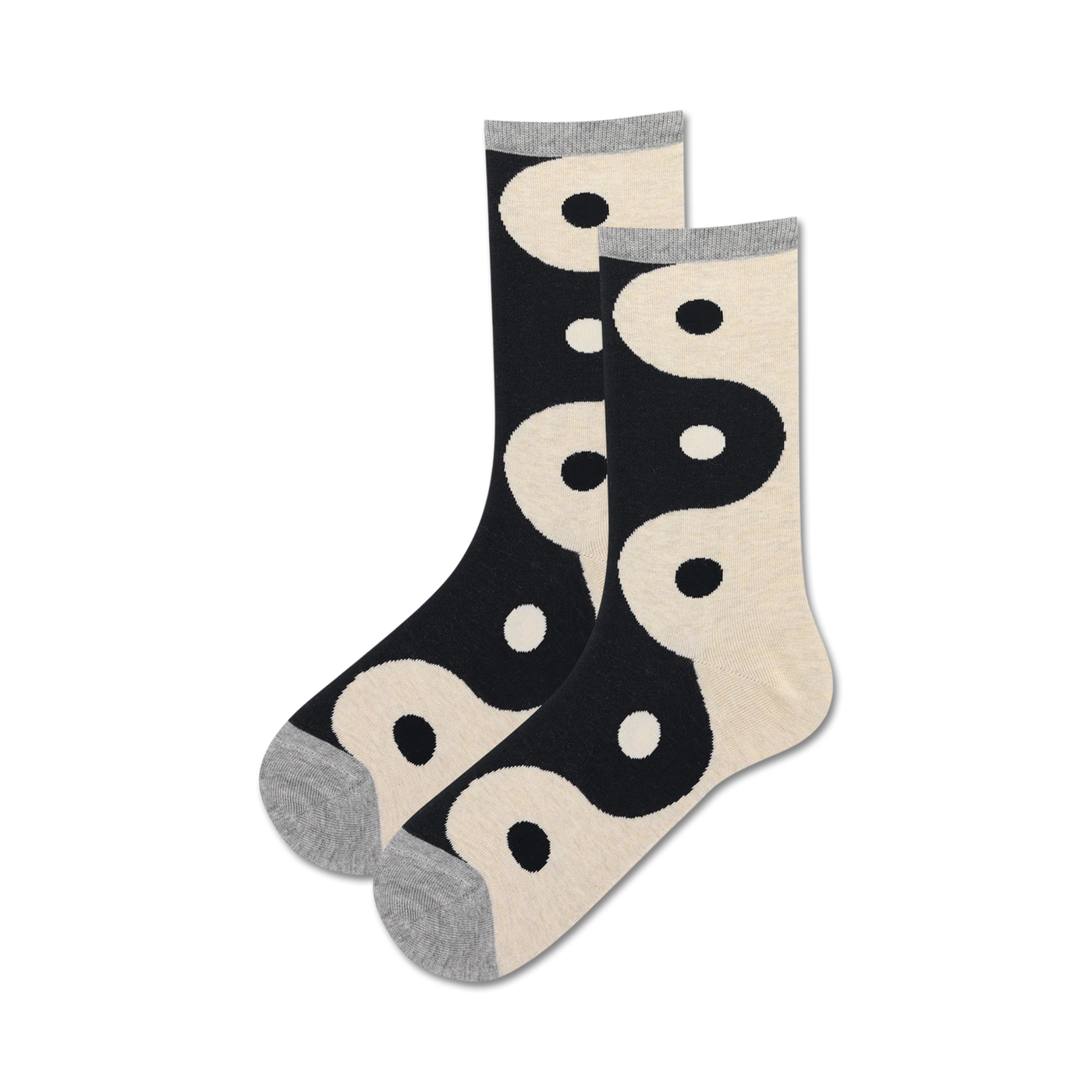 Pair of crew socks in black and cream, featuring a repeating yin yang symbol design. 