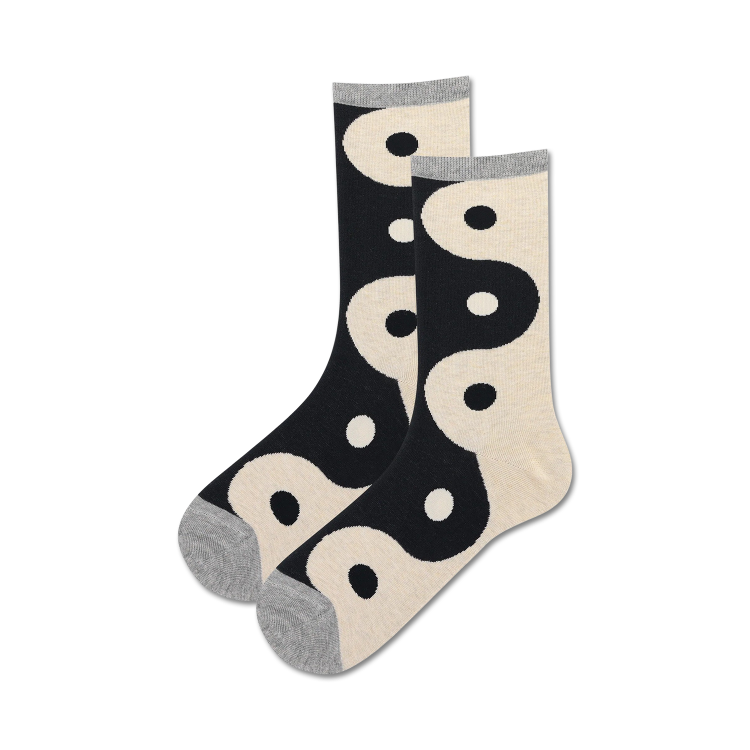 Pair of crew socks in black and cream, featuring a repeating yin yang symbol design. 