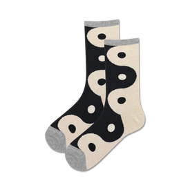 black and white crew socks adorned with interlocking yin yang pattern.   