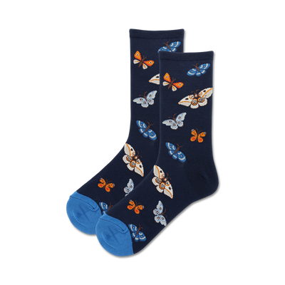 Pair of navy crew socks with a fun pattern of colorful butterflies. The socks have a blue toe and heel.