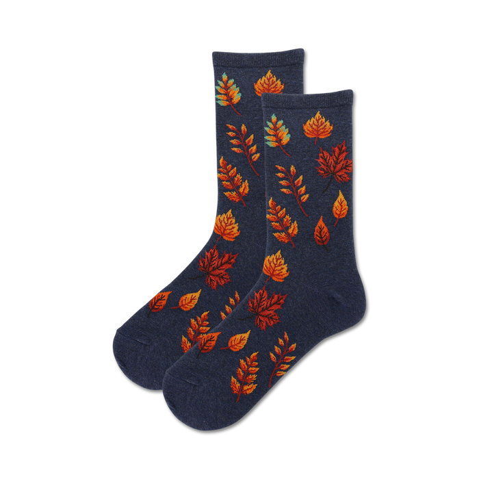 autumn leaves crew socks for women. pattern of fall leaves in orange, red, yellow, and teal on a navy blue background.   }}