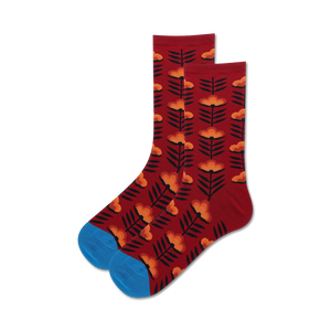 retro floral socks in orange, yellow, and green on a red background. cool women's crew socks.   